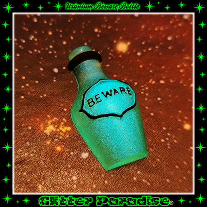 Broche: Uranium Beware Bottle
