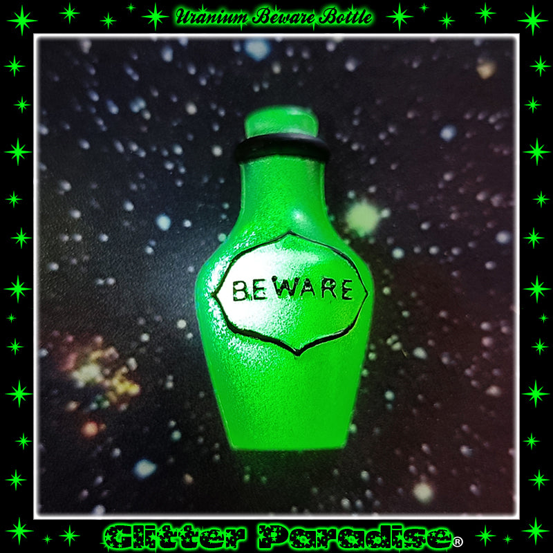 Broche: Uranium Beware Bottle