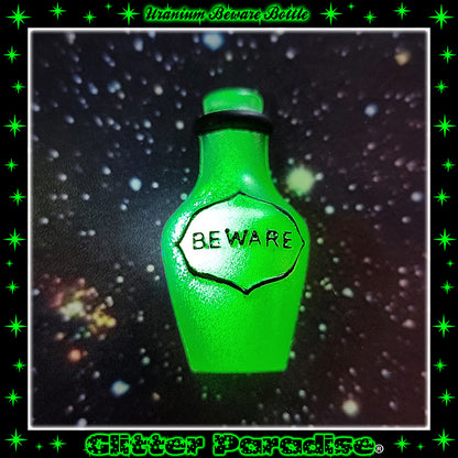 Broche: Uranium Beware Bottle