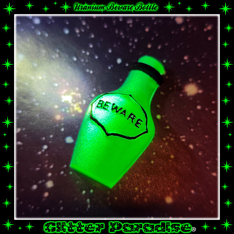Broche: Uranium Beware Bottle